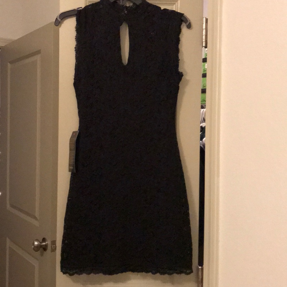 Sleeveless black lace dress